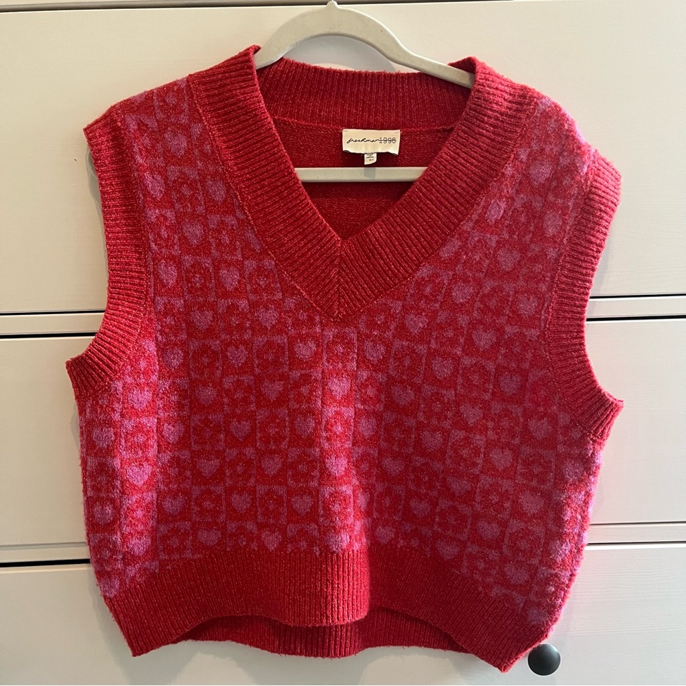 pink sweater vest